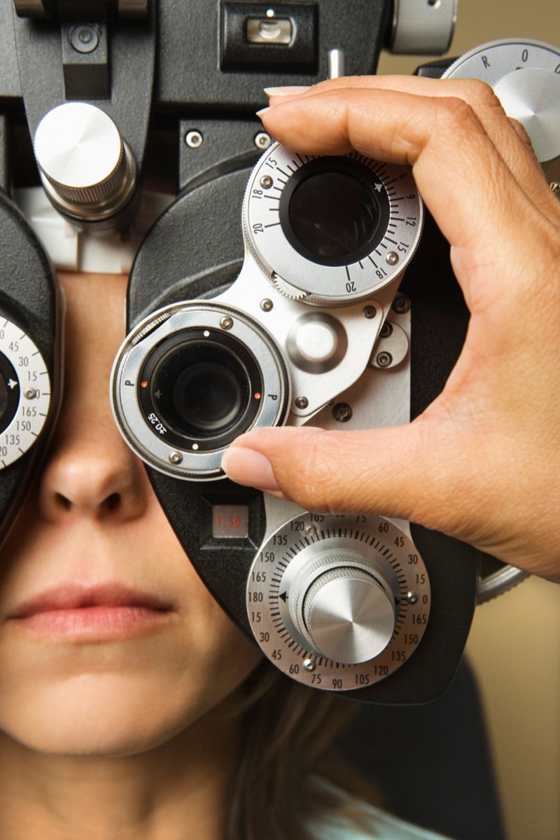 Woman receiving comprehensive eye exam